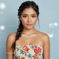 Elegant Young Woman with Floral Top and Braided Hair in Studio