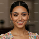 Close-up of Happy Woman with Bright Smile and Floral Top