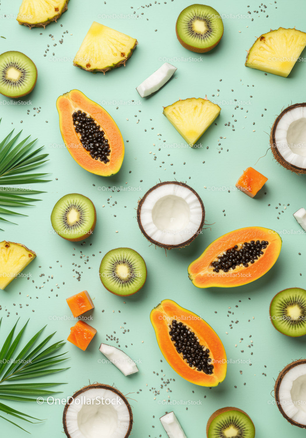 Tropical fresh papaya kiwi pineapple and coconut slices