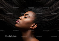 Serene young woman with flowing black hair profile
