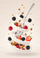Fresh Berries and Granola Swirling with Yogurt and Spoon