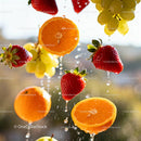 Fresh Strawberries and Citrus Drops in Midair Splash