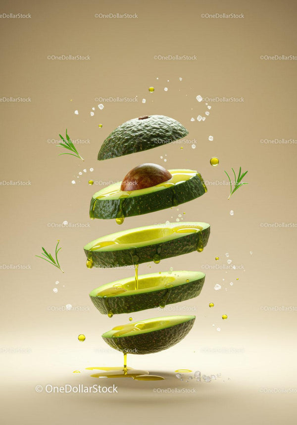 Floating sliced avocado with dripping oil and herbs