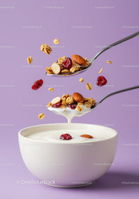 Healthy yogurt bowl with granola and dried berries
