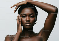 Elegant Black Woman Portrait with Natural Makeup and Jewelry