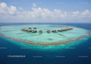 Overwater Bungalows in a Tropical Paradise with Clear Blue Water