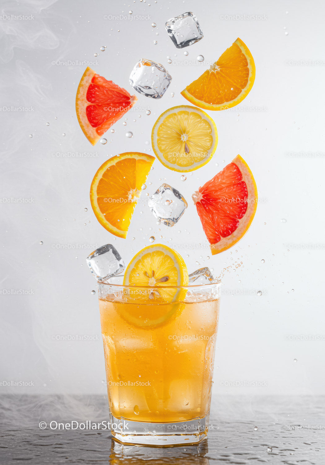 Refreshing citrus drink with ice cubes and fruit slices