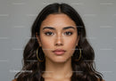 Close Up of a Stylish Woman with Brown Eyes and Hoop Earrings