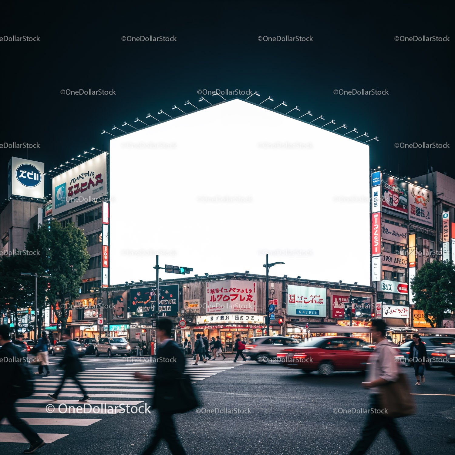 Ruchliwe skrzyżowanie w japońskim mieście nocą z oświetlonym billboardem