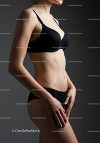 Elegant Woman in Black Lingerie with Artistic Studio Lighting