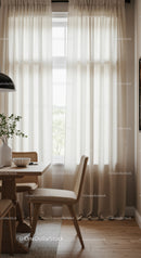 Bright and Cozy Dining Room with Beige Curtains and Natural Light