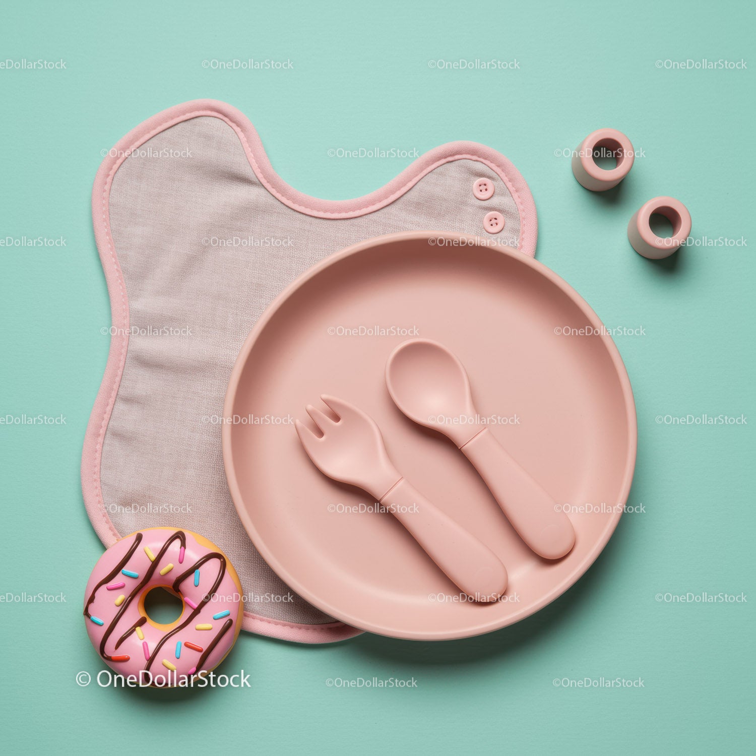 Minimalist baby feeding set with playful donut toy