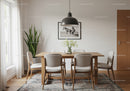 Bright Modern Dining Room with Wooden Table and Houseplant