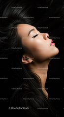 Serene profile of woman with flowing dark hair
