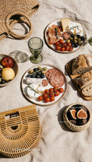 Elegant Outdoor Picnic with Cheese and Fresh Bread