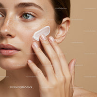 Close-Up of Woman Applying Face Cream for Glowing Skin