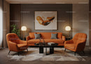 Modern living room with vibrant orange seating and art