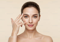 Young Woman with Clear Skin in Skincare Concept with Facial Care