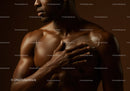 Elegant Portrait of a Dark-Skinned Woman with Smooth Skin and Sensual Pose