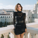 Elegant Woman in Black Lace Dress on City Balcony