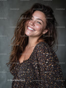 Happy Woman with Curly Hair and Floral Dress in Studio