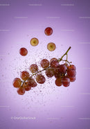 Red grapes submerged with sparkling bubbles on purple