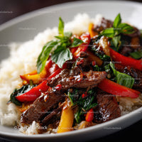 Colorful Beef and Vegetable Stir Fry with Fresh Basil on Plate