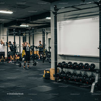 Group workout session in modern gym training area