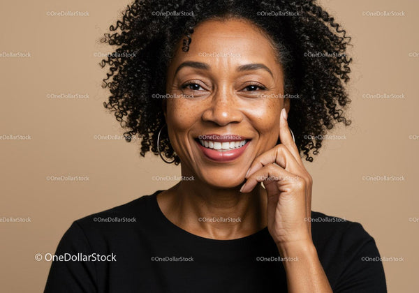Portrait of a Smiling Black Woman with Curly Hair in Professional Setting