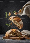 Rustic Bread Breaking with Fresh Rosemary Sprigs