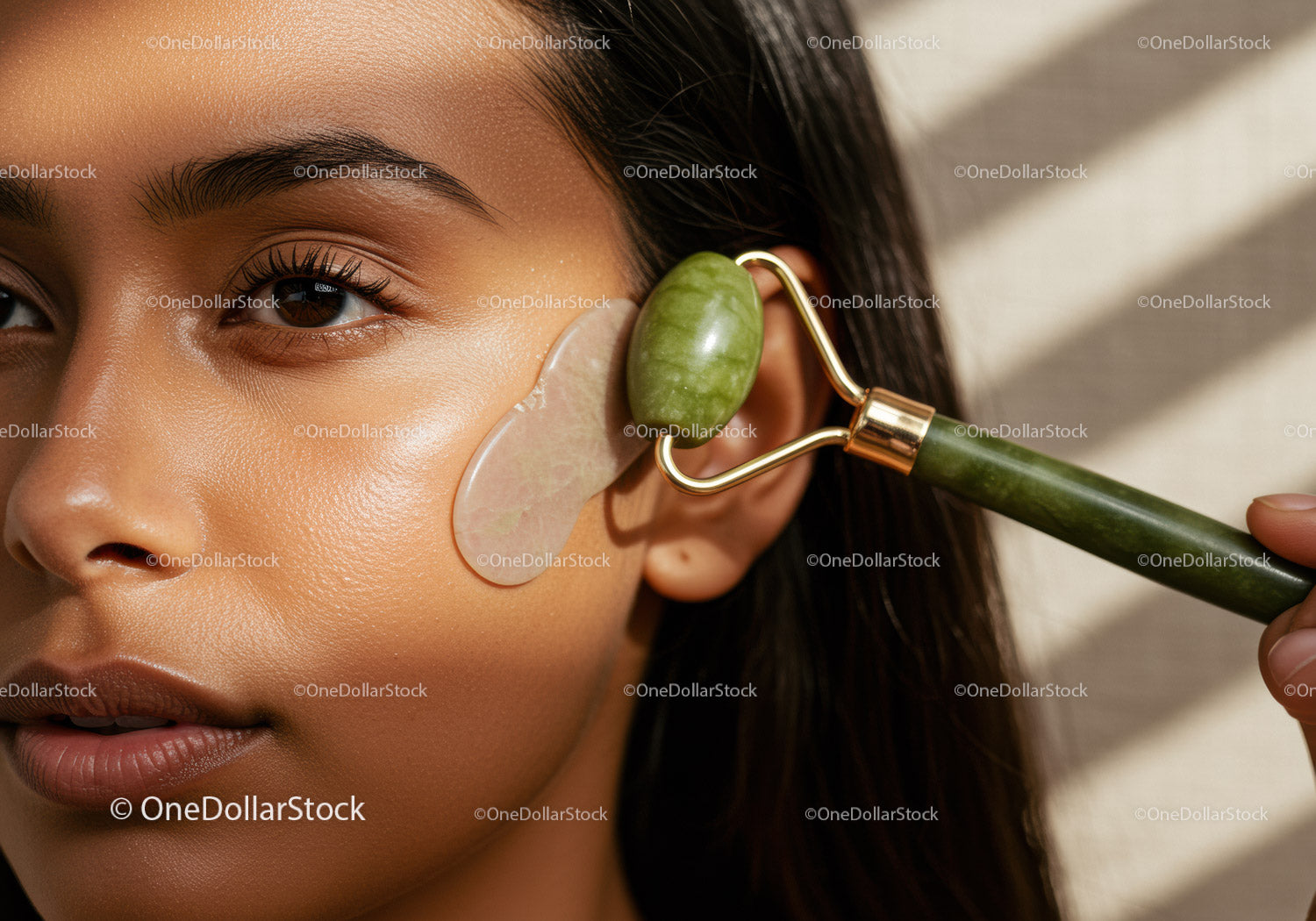 Young Woman Receiving Relaxing Jade Roller Facial Treatment