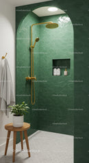 Modern green tile shower with gold fixtures and plant