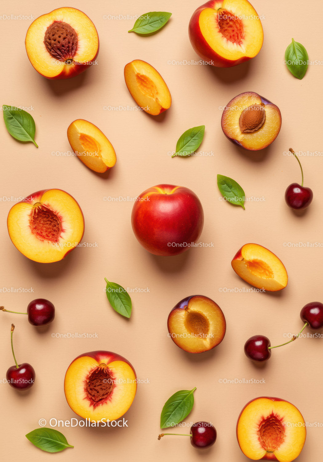 Fresh peaches, plums, cherries and basil on beige background