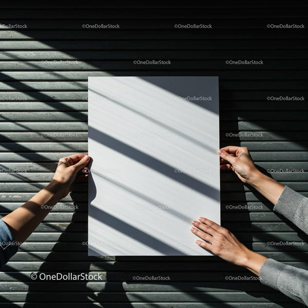 Hands Holding Blank Paper Against Textured Metal Surface JPG Mockup Image