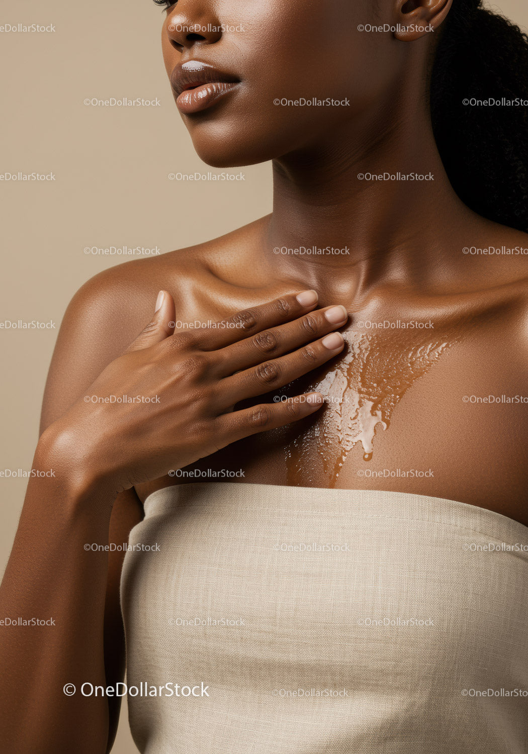Elegant Black Woman Showing Glossy Skin with Soft Lighting