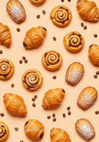 Fresh assorted pastries and coffee beans on beige background