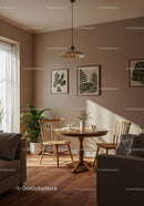 Cozy dining area with natural sunlight and green decor