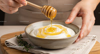 Creamy Yogurt with Honey Drizzle and Fresh Thyme for Breakfast