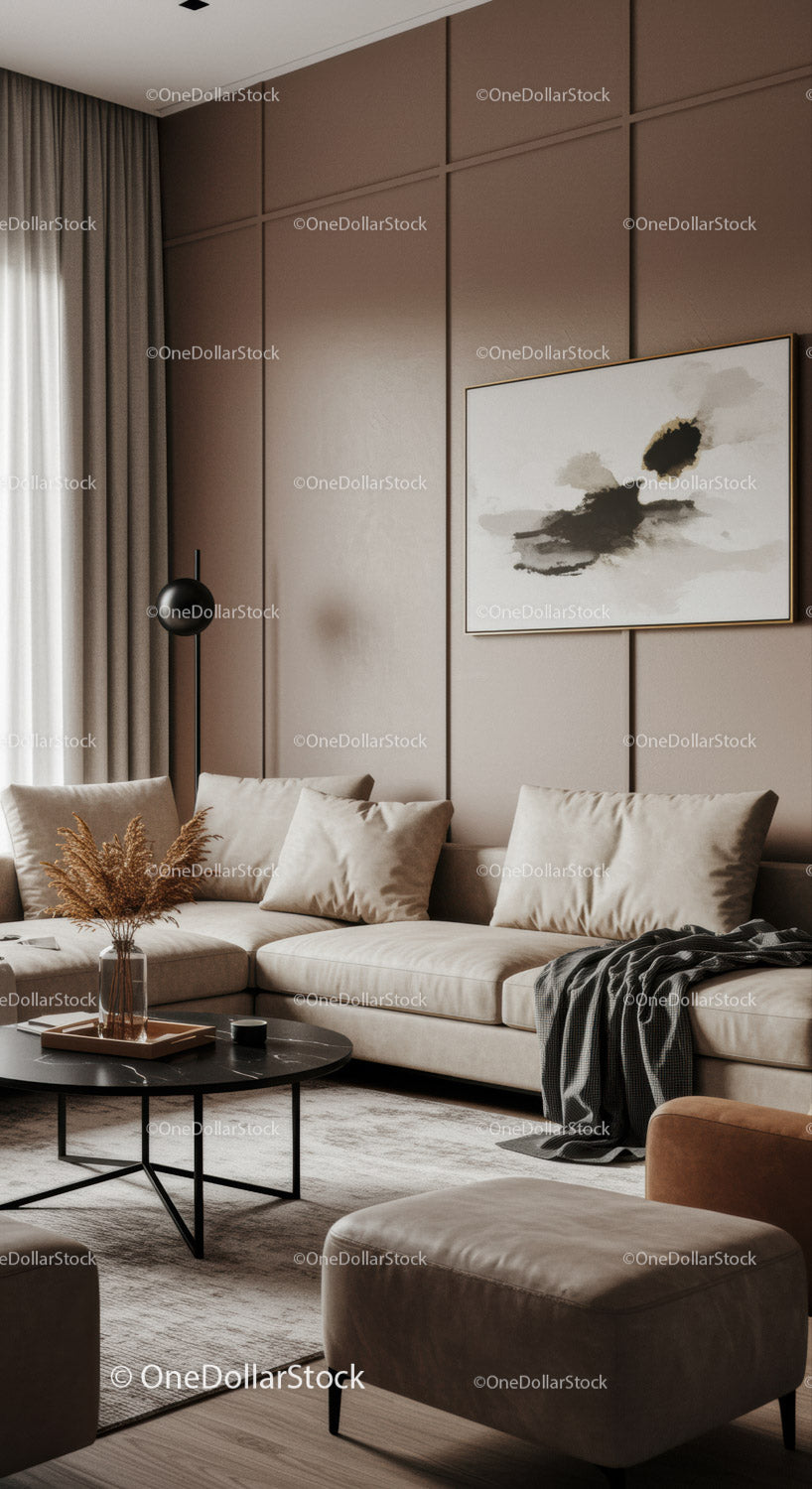 Elegancki, nowoczesny salon z beżową sofą i abstrakcyjną grafiką ścienną