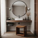 Modern Bathroom with Wooden Vanity and Round Mirror with Vases