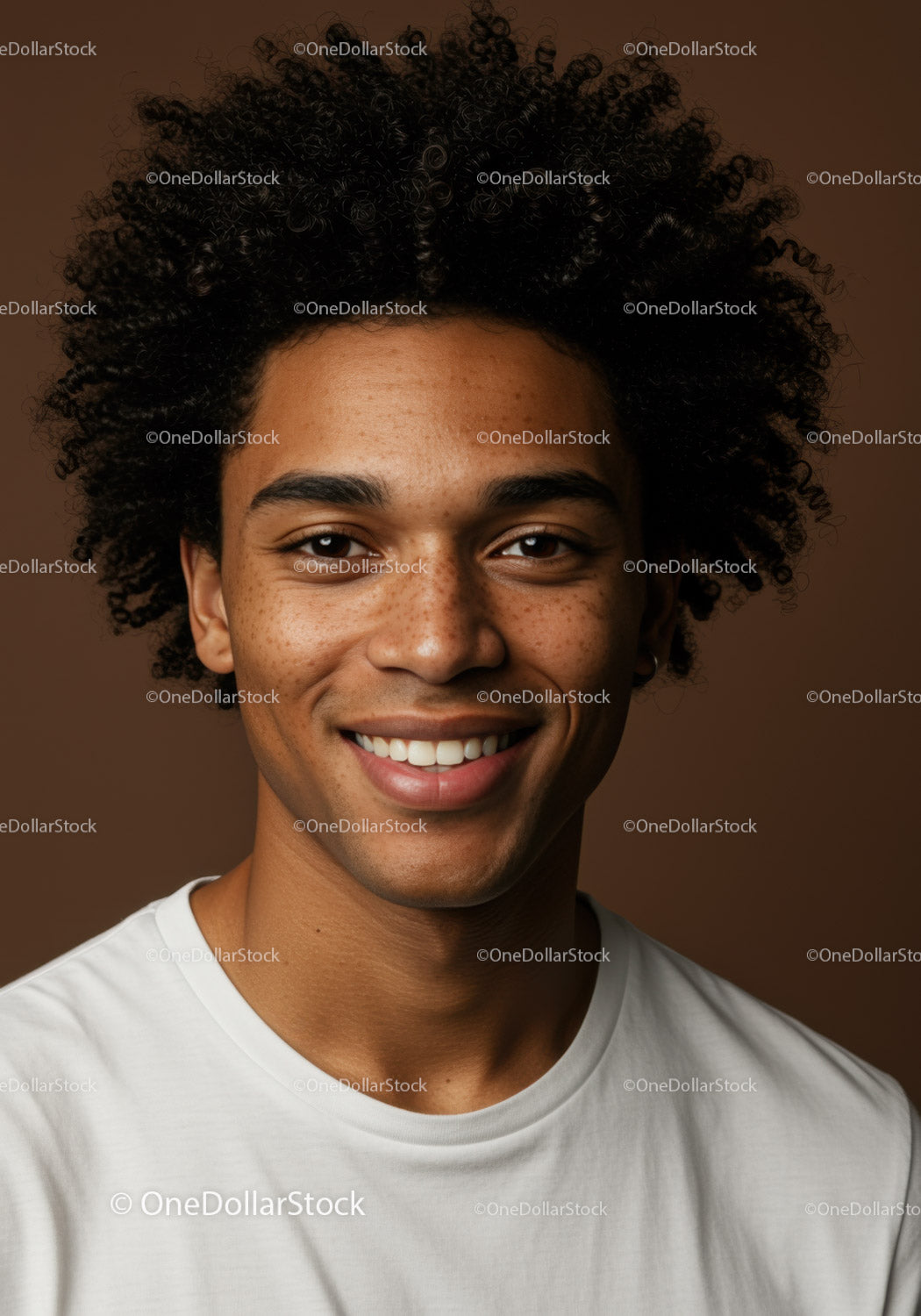 Portrait of Smiling Young Man with Curly Hair and Bright Smile