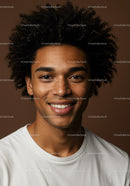 Portrait of Smiling Young Man with Curly Hair and Bright Smile