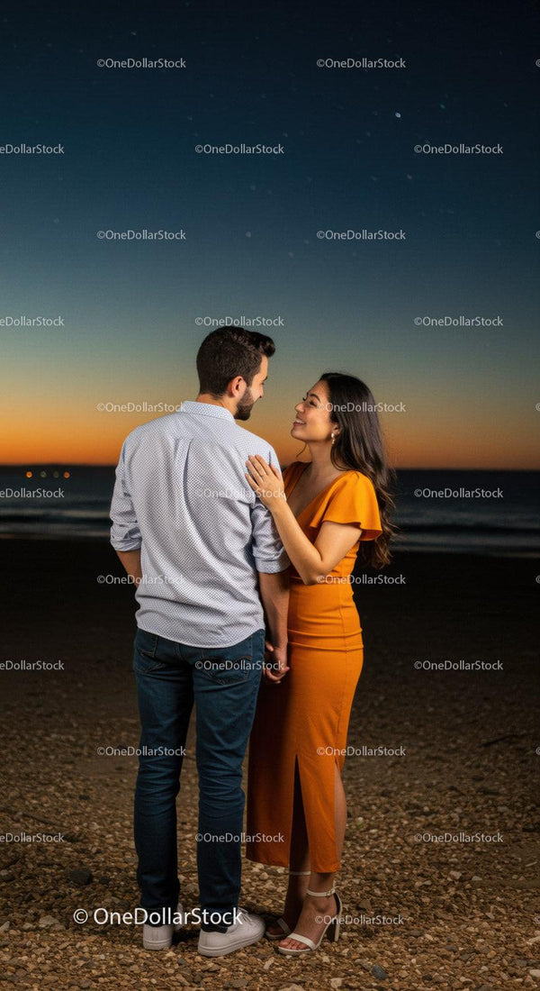 Couple sharing intimate moment at sunset on the beach