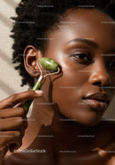 Close-Up of African Woman Using Jade Roller for Skin Rejuvenation