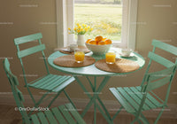 Bright breakfast setting with fresh oranges and juice