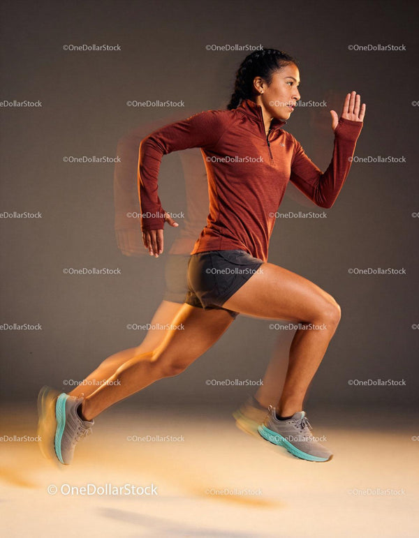 Athletic woman sprinting with dynamic motion blur effect