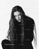 Monochrome Portrait of Young Woman with Wet Hair and Intense Gaze