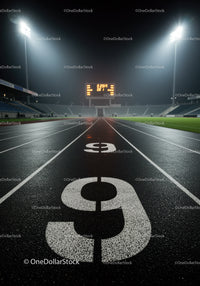 Empty illuminated running track lane nine at night stadium