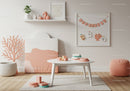 Soft Pastel Nursery Decor with Playful Elements and Modern Design