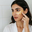 Young Woman Applying Under Eye Patches for Skin Rejuvenation